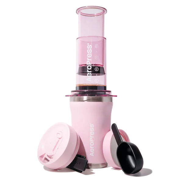AeroPress Go Plus Pink coffee maker portable press brewer with compact travel design for easy brewing on the go