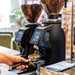 Black Macap Supra 83 high performance espresso coffee grinder with 83mm flat burrs for professional café use