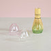 Bamboo matcha whisk stand paired with glass stand